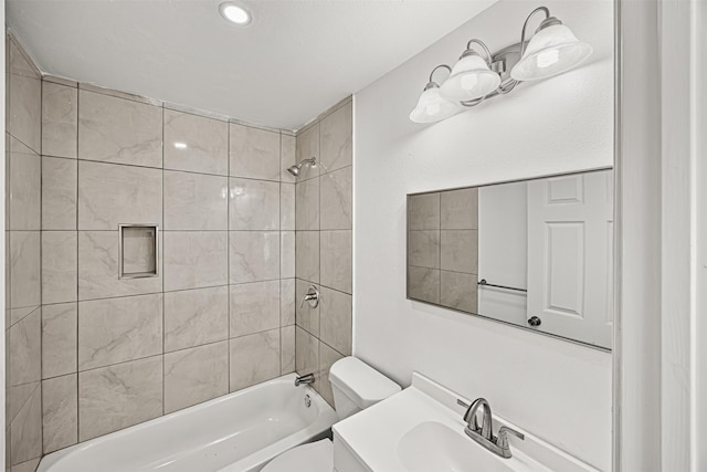 full bathroom featuring shower / washtub combination, vanity, and toilet