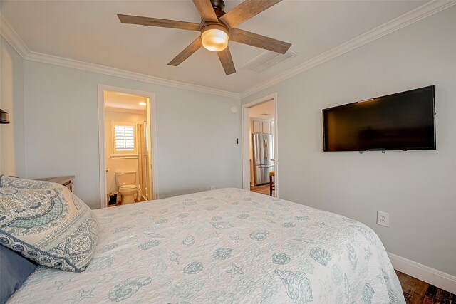 411 Olive St, Surfside Beach, TX 77541 - bedroom featuring visible vents, baseboards, crown molding, and freestanding refrigerator