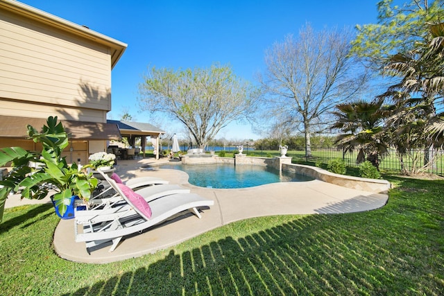 view of swimming pool with a patio area, a fenced backyard, a fenced in pool, and a lawn