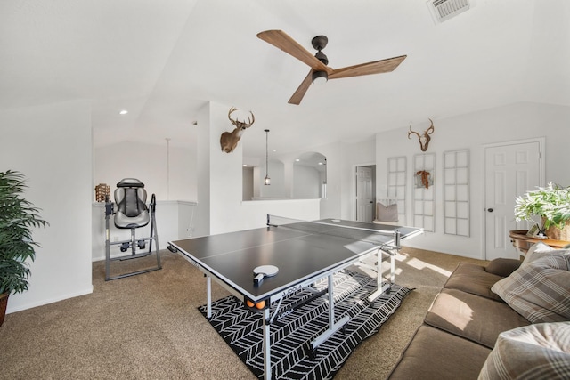 rec room with arched walkways, lofted ceiling, visible vents, carpet flooring, and ceiling fan