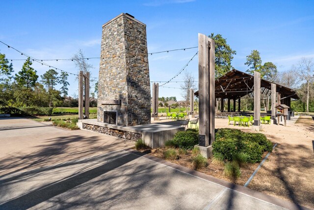 view of home's community with a patio and a gazebo