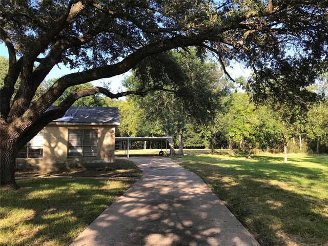 exterior space featuring a front yard