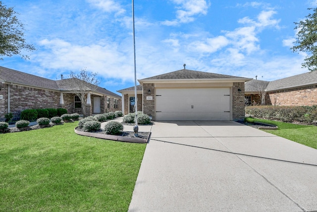 view of front facade featuring a garage, a front lawn, concrete driveway, and brick siding