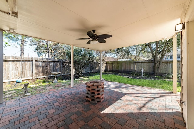 view of patio / terrace with ceiling fan and a fenced backyard