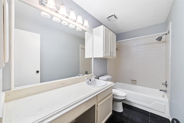 full bath with shower / bath combination, visible vents, toilet, vanity, and tile patterned floors