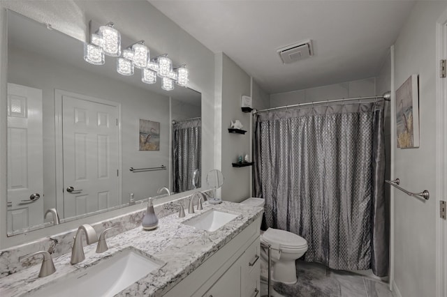 full bath featuring visible vents, a sink, toilet, and double vanity