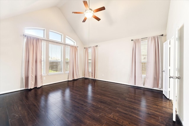 empty room with ceiling fan, high vaulted ceiling, and wood finished floors