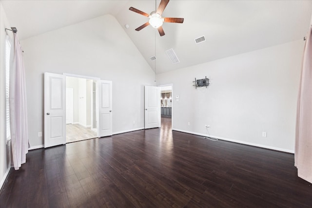 unfurnished room with high vaulted ceiling, ceiling fan, visible vents, and wood finished floors