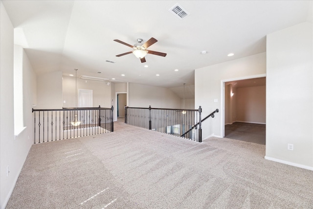 empty room with baseboards, visible vents, ceiling fan, carpet flooring, and recessed lighting