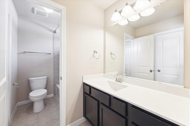 full bath featuring visible vents, toilet, vanity, baseboards, and tile patterned floors