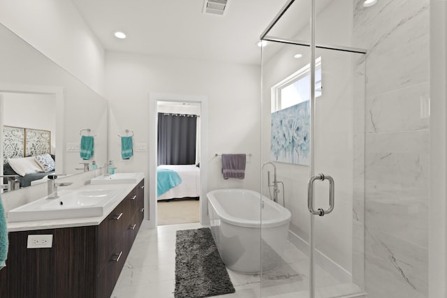 ensuite bathroom with double vanity, visible vents, a sink, and ensuite bathroom