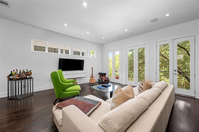 living room featuring baseboards, visible vents, wood finished floors, french doors, and recessed lighting