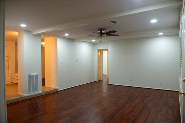 spare room with visible vents, dark wood-style flooring, and recessed lighting