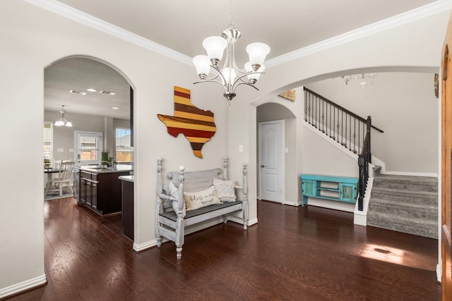 interior space featuring a chandelier, dark wood-type flooring, stairway, and arched walkways