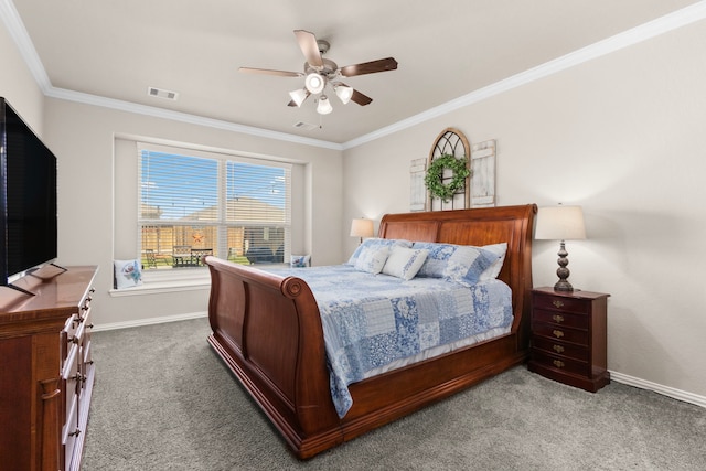 bedroom featuring carpet flooring, a ceiling fan, visible vents, baseboards, and ornamental molding