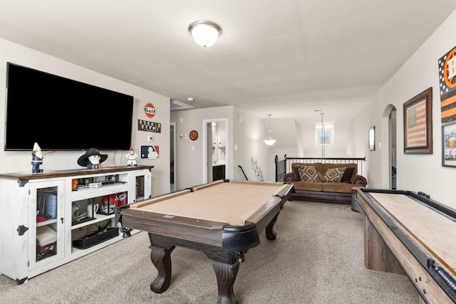 rec room featuring arched walkways, pool table, and carpet