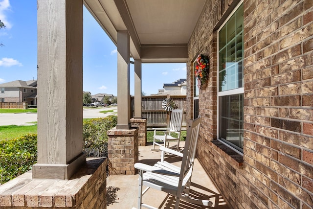3538 Dancing Daisy Ln, Richmond, TX 77406 - view of patio featuring a porch and a residential view