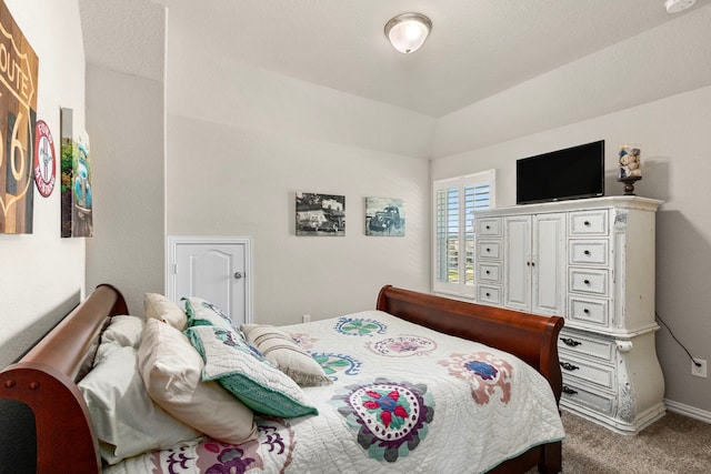 carpeted bedroom with baseboards