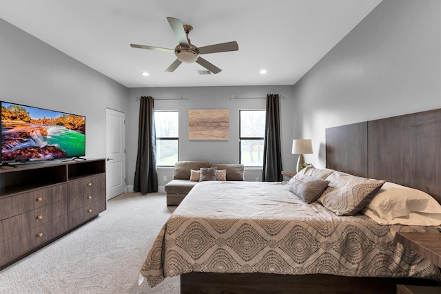 bedroom featuring recessed lighting, light carpet, a ceiling fan, baseboards, and visible vents