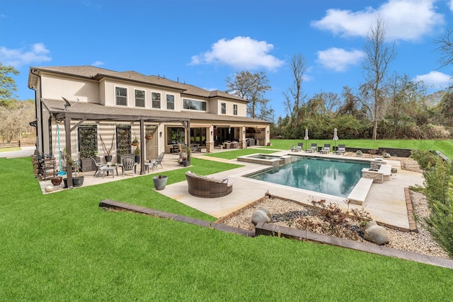 back of house featuring an outdoor pool, stucco siding, a yard, and a patio