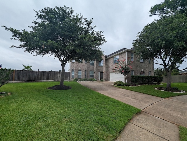 view of front of property with brick siding, a front yard, and fence