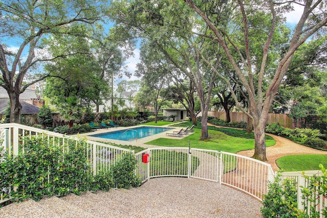 view of pool featuring a fenced in pool, a yard, a patio, a gate, and a fenced backyard