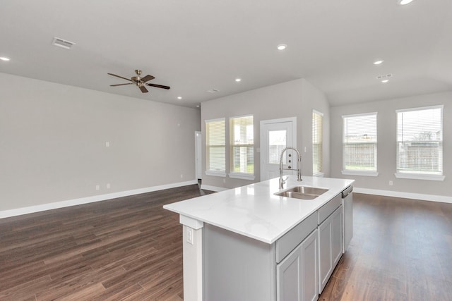 kitchen with visible vents, dark wood-style flooring, a sink, and recessed lighting