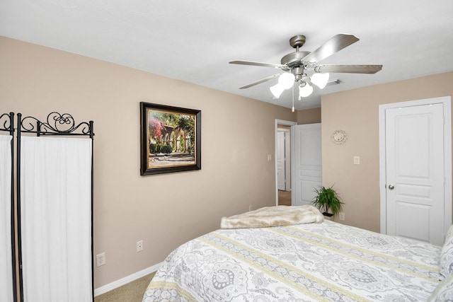 bedroom with carpet floors, ceiling fan, and baseboards