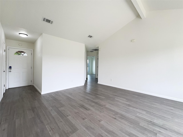 8611 Deep Valley Dr, Houston, TX 77044 - foyer featuring vaulted ceiling with beams, wood finished floors, visible vents, and baseboards
