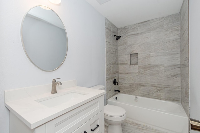 bathroom with marble finish floor, bathtub / shower combination, vanity, and toilet