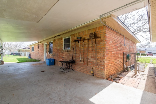 view of patio featuring fence