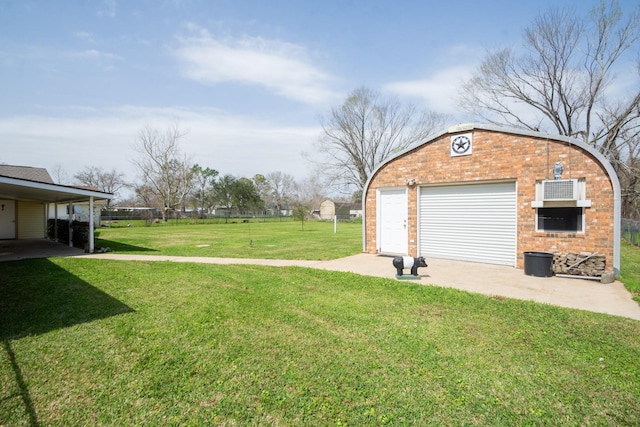 view of yard featuring an outbuilding and a detached garage