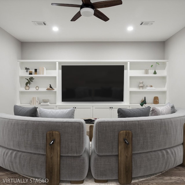 living area featuring recessed lighting, visible vents, a ceiling fan, and wood finished floors