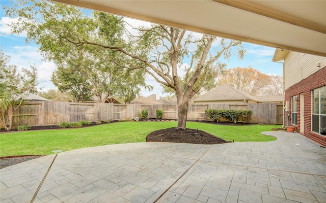 view of patio with a fenced backyard