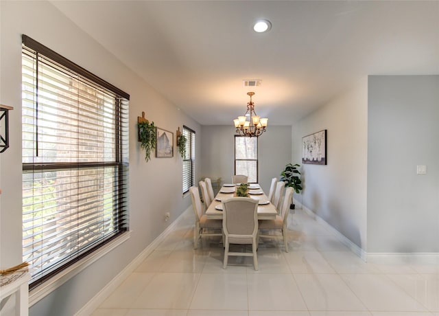 tiled dining room featuring a chandelier, recessed lighting, visible vents, and baseboards