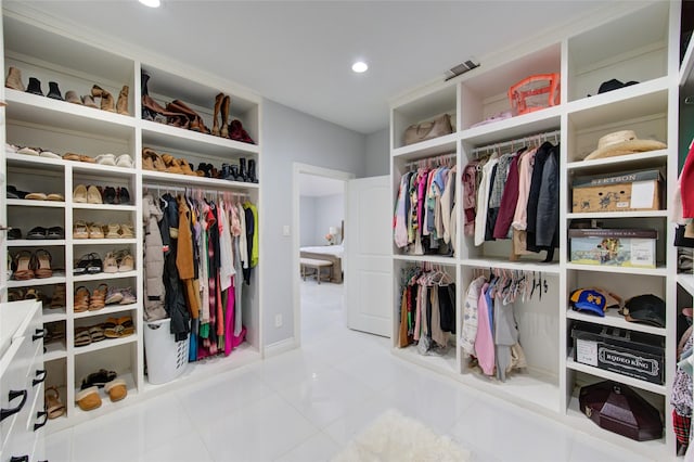 walk in closet featuring tile patterned floors