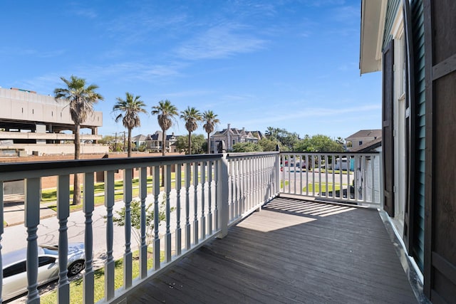 wooden deck featuring a residential view