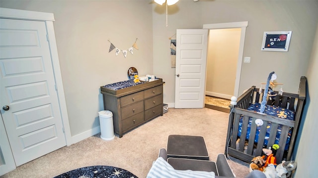 bedroom with baseboards and carpet flooring