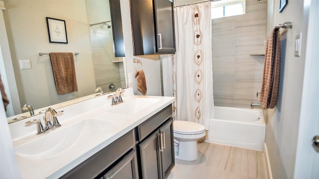 full bathroom with toilet, shower / bath combination with curtain, double vanity, and a sink