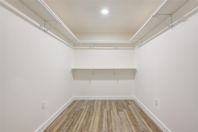 walk in closet featuring light wood-type flooring