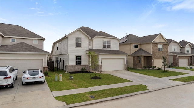 24902 Bastiani Canvas Ln, Katy, TX 77493 - view of front of home with driveway, a garage, brick siding, and a residential view