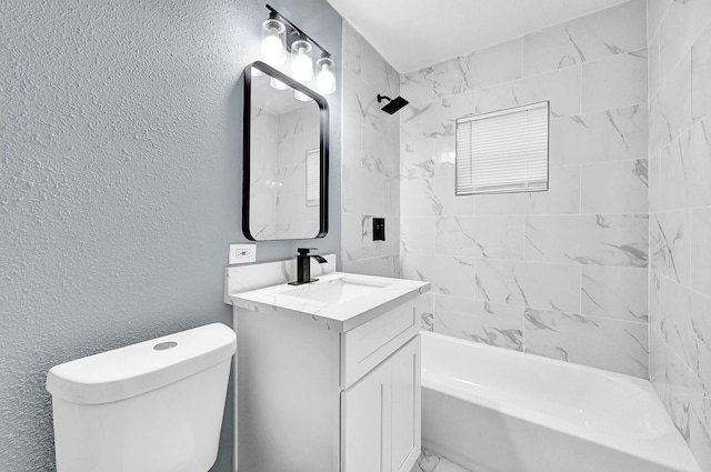 bathroom featuring shower / bathtub combination, a textured wall, toilet, vanity, and marble finish floor