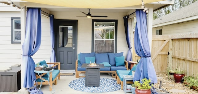 view of patio featuring ceiling fan, fence, and an outdoor hangout area