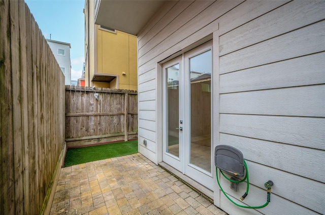 view of patio featuring fence