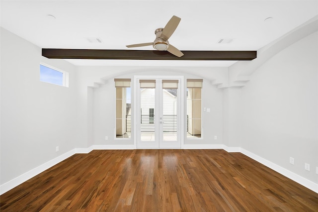 unfurnished room with french doors, wood finished floors, beam ceiling, and baseboards