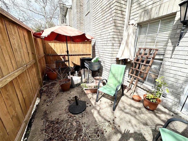 view of patio / terrace with fence