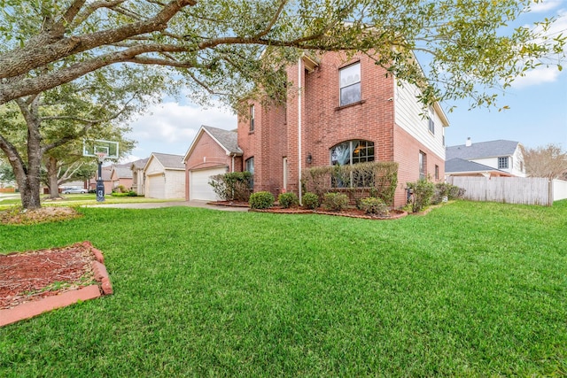 view of front of property with fence, a front lawn, and brick siding