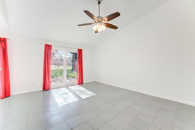 empty room with vaulted ceiling, a ceiling fan, and baseboards