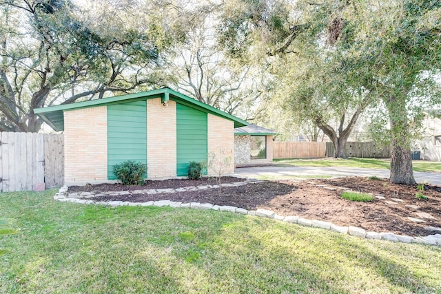 view of outdoor structure featuring fence