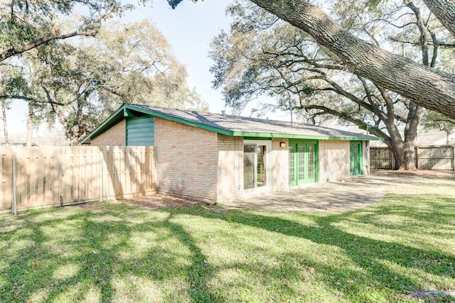 view of outdoor structure featuring fence private yard